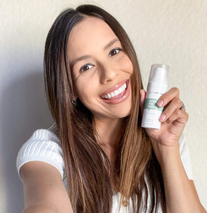 Customer applying skincare